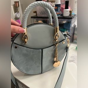 Mia K collection round purse mint with gold fixtures cross body